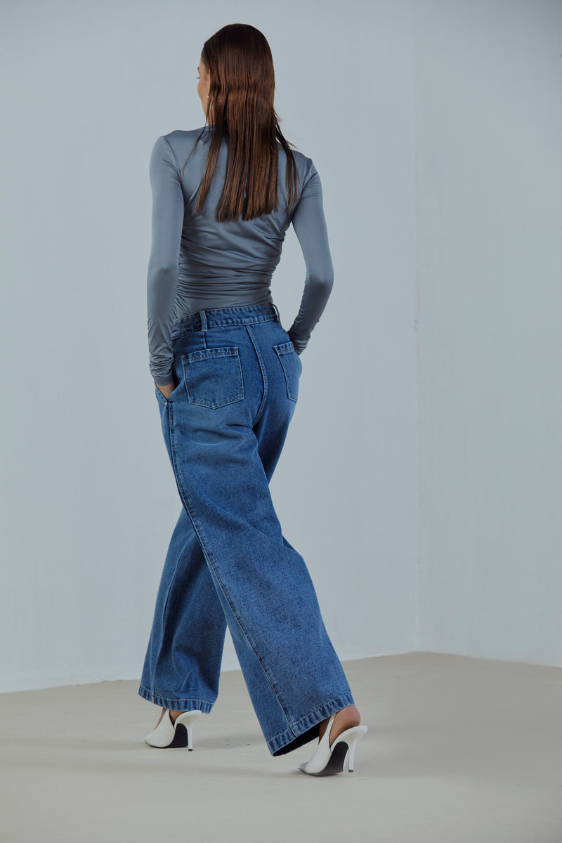 Wide-Leg Pleated Jeans